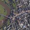 Oblique aerial view centred on the High Street with the Bridge of Annan adjacent, taken from the SSW.