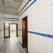 Interior. View of tiled corridor within the bath house.