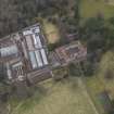 Oblique aerial view centred on the stable block with the walled garden adjacent, taken from the SW.