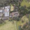 Oblique aerial view centred on the stable block with the walled garden adjacent, taken from the SSW.