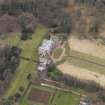 Oblique aerial view centred on the country house, taken from the SE.