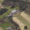 Oblique aerial view centred on the country house, taken from the E.