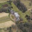 Oblique aerial view centred on the country house, taken from the NNW.