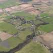 General oblique aerial view centred on the village, taken from the SE.