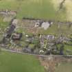 Oblique aerial view centred on the village, taken from the N.