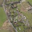 Oblique aerial view centred on the village, taken from the WNW.