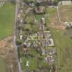 Oblique aerial view centred on the village, taken from the W.