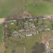 Oblique aerial view centred on the village, taken from the S.