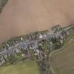 Oblique aerial view centred on the village, taken from the WNW.