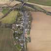 Oblique aerial view centred on the village, taken from the S.