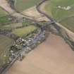 General oblique aerial view centred on the village, taken from the SE.