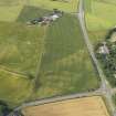 General oblique aerial view of the cropmarks of the barrow, taken from the SW.