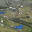 Oblique aerial view of T in the Park at Balado Bridge airfield, taken from the W.