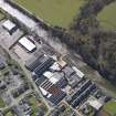 Oblique aerial view centred on the mills, taken from the NW.