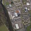 Oblique aerial view centred on the mills, taken from the SE.