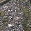 General oblique aerial view centred on the High Street, taken from the SE.