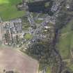 Oblique aerial view centred on the village, taken from the ENE.