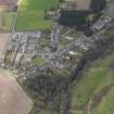 Oblique aerial view centred on the village, taken from the NE.