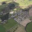 Oblique aerial view centred on the village, taken from the S.