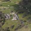 Oblique aerial view centred on the hotel with the stable block adjacent, taken from the ESE.