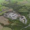 Oblique aerial view centred on the quarry, taken from the SE.