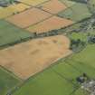 General oblique aerial view of Sprouston village and the cropmarks, taken from the N.