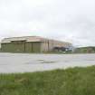 View from NE (airside) of central unprotected C type aircraft hangar.