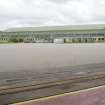 General view from NW through the doors of the E C type aircraft hangar looking to the J type aircraft hangar.