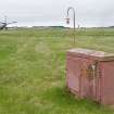 General view from W of NW dispersal area with a fire point in the foreground, taxiway and Nimrod Mk 2.