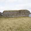 Courtyard, N wall, W end, view from S