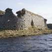 NW turret and W wall, view from loch to NW