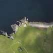 Oblique aerial view centred on the Broch of Mousa with The Haa adjacent, taken from the SE.