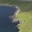 Oblique aerial view centred on the Broch of Mousa with The Haa adjacent, taken from the S.
