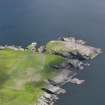 Oblique aerial view of the Broch of Burraland looking towards Hoga, taken from the WSW.