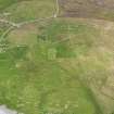 Oblique aerial view of the farmsteads at Skelpigarth, looking N.