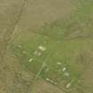 Oblique aerial view of part of The Garths Chain Home Radar Station and the farmstead, looking NE.