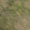 Oblique aerial view centred on the remains of the Stanydale temple, looking N.
