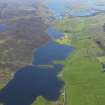 General oblique aerial view of the Loch of Tingwall with the Law Ting Holm in the foreground and Scalloway in the distance, looking SSW.