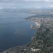 General oblique aerial view lookings along the Firth of Tay towards the bridges and Dundee, taken from the NE.