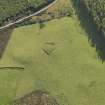 Oblique aerial view of the remains of Elsie the Greater Recumbent Stone Circle, taken from the NW.