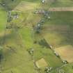 Oblique aerial view of the henge at Staney Hill, taken from the SW.