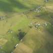 Oblique aerial view of the henge at Staney Hill, taken from the SE.