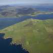 General oblique aerial view looking across South Walls to North Bay and Hoy beyond, taken from the SSE.