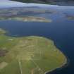 General oblique aerial view looking from Point of Hackness across Longhope towards Crockness, taken from the SE.