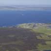 Oblique aerial view looking towards Flotta Oli Terminal with Scapa Flow beyond, taken from the S.