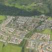 General oblique aerial view of Menstrie village, taken from the SSE.