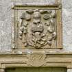 Detail of lintel with date stone (1671) and heraldic panel above entrance