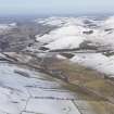 General oblique aerial view along the Bowmont Water towards Town Yethom and Kirk Yetholm, looking to the NNE.