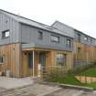 General view of Plot 22, House HS by Malcolm Fraser Architects, taken from the WNW.