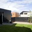 Rear view of Plot 2, The Stone House by NORD Architects, taken from the ESE.